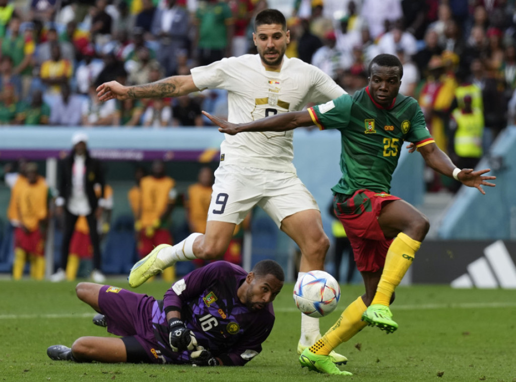 Serbia draw 3-3 with Cameroon at football World Cup