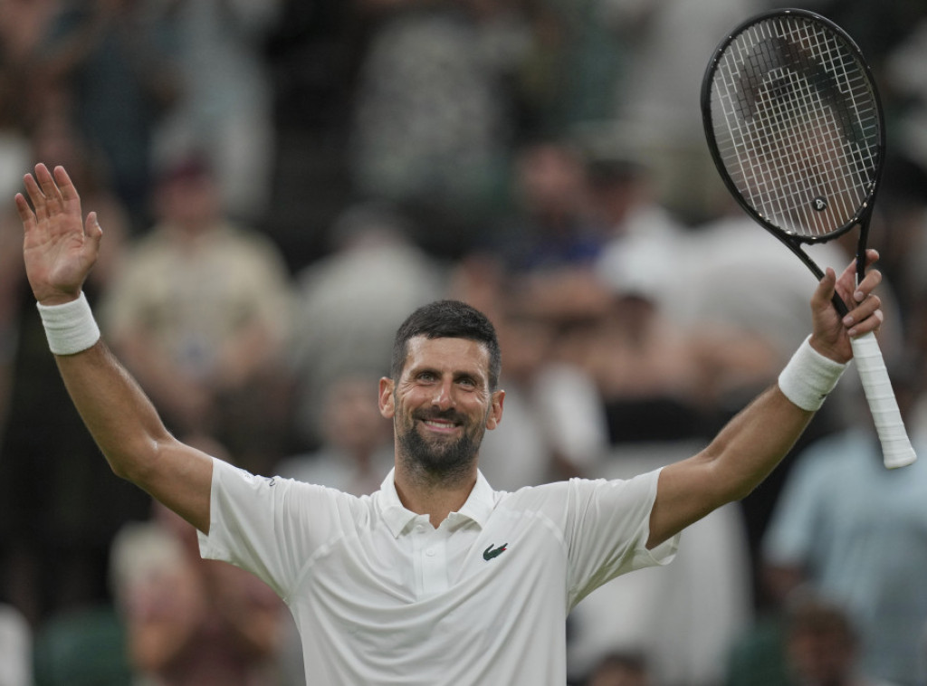 Djokovic through to Wimbledon second round